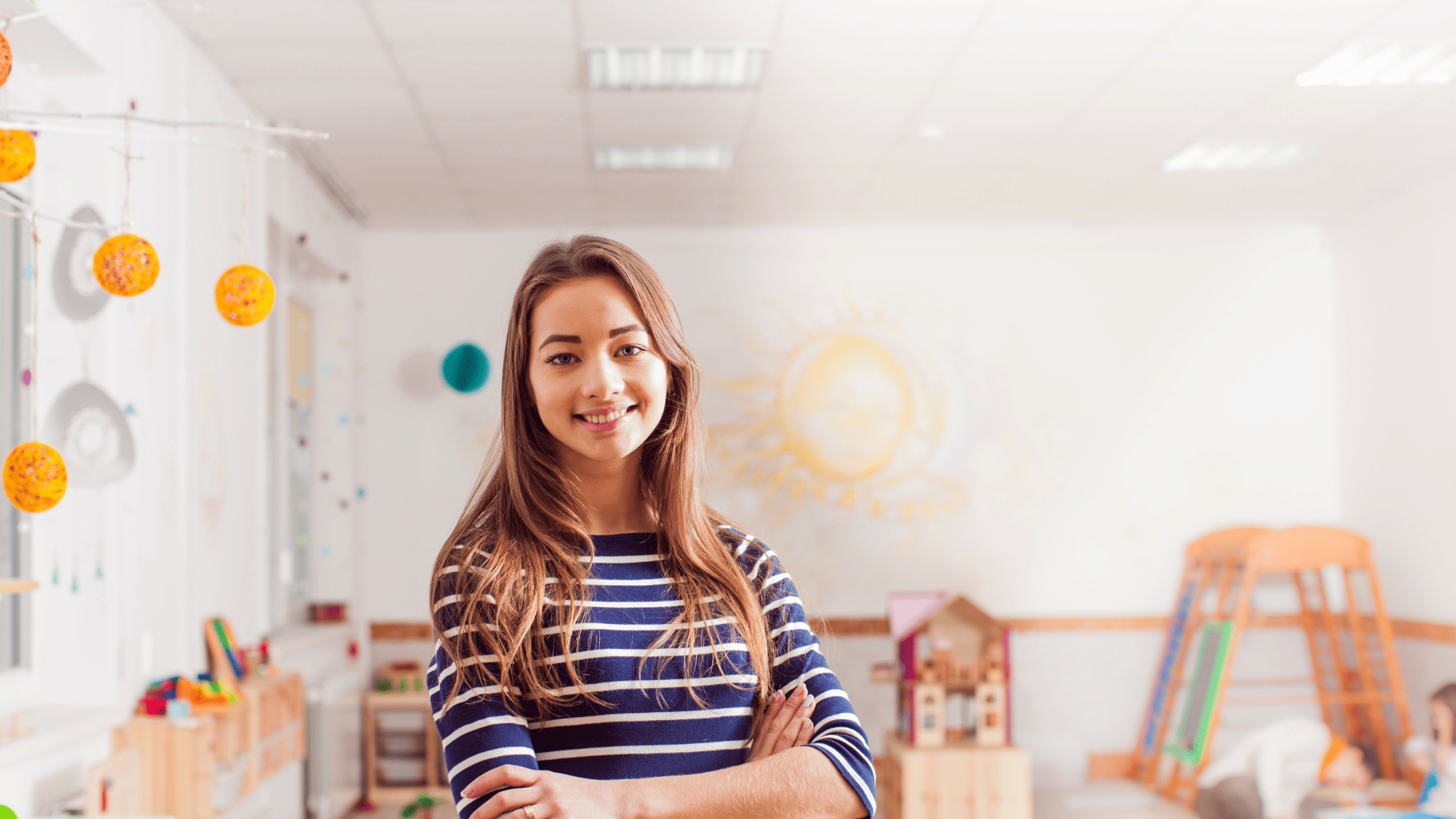 Female early childhood educator in classroom